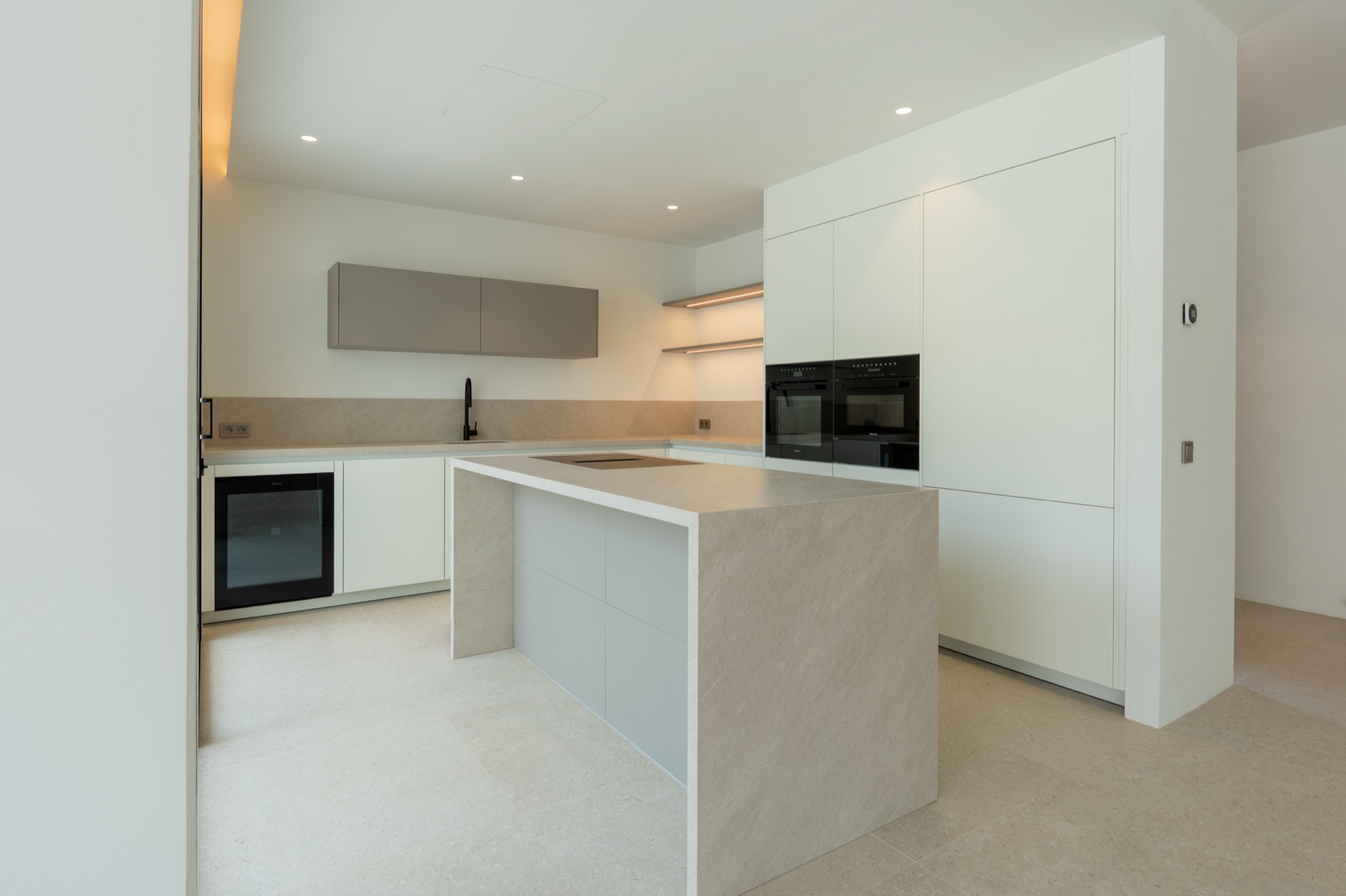 Kitchen open to living and staircase
