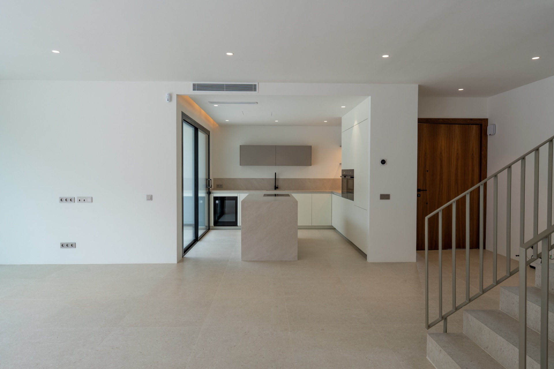 Kitchen with Miele wine cooler and oven