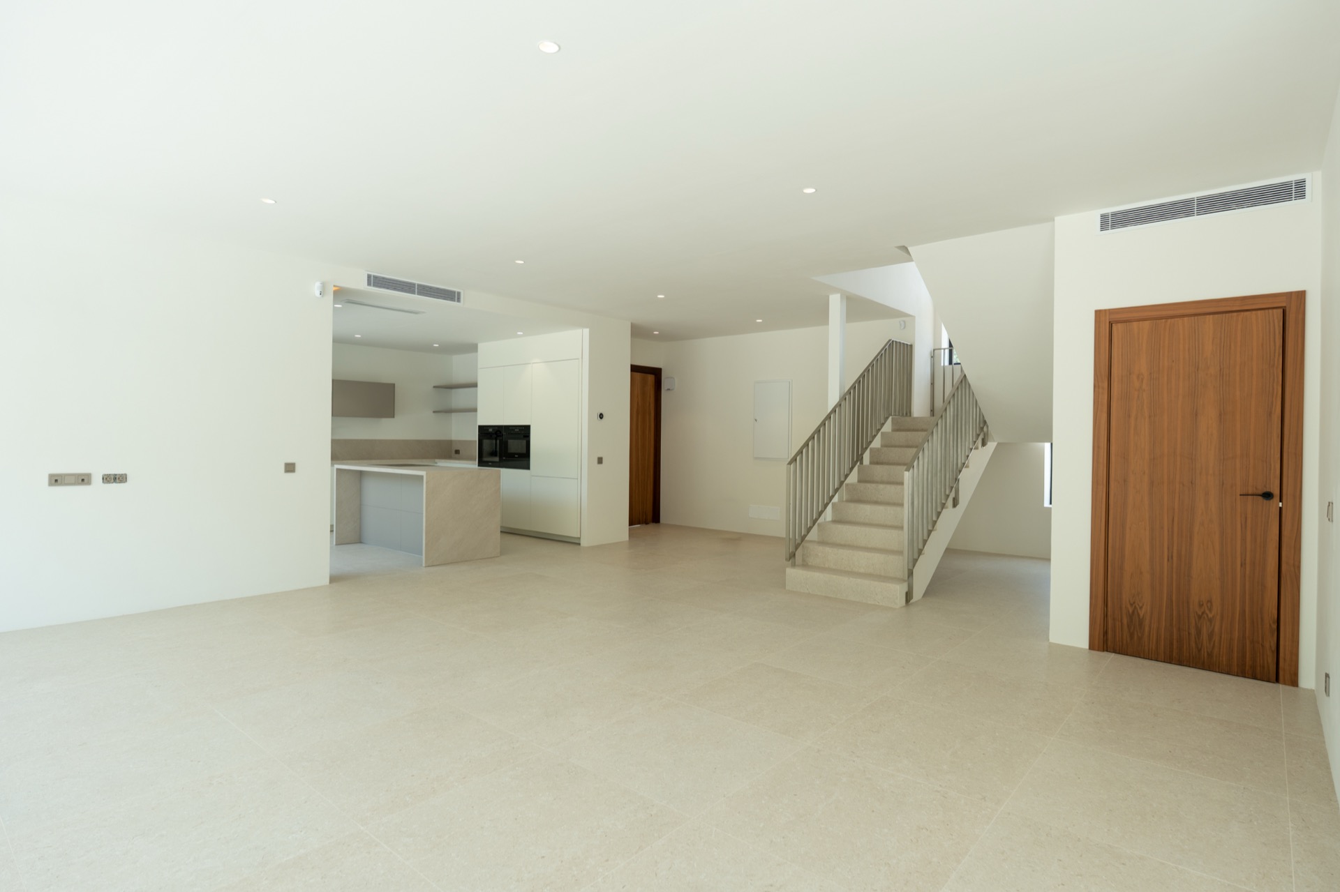 Kitchen with Miele wine cooler and oven