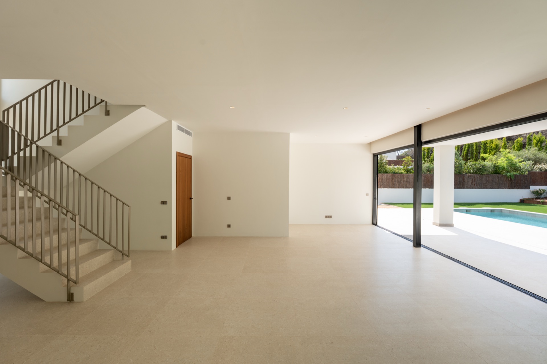 Open-plan living with curved sofa